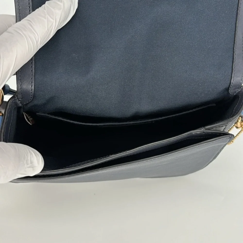 Coach Saddle Bag With Horse And Carriage Dot Print